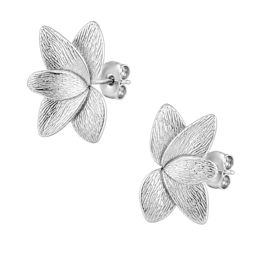 Silver flower stud earrings close-up