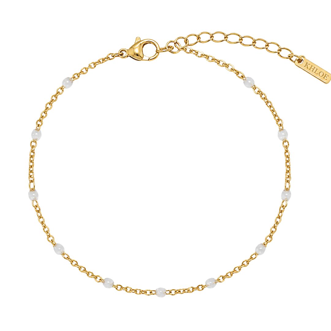 Pulsera fina de oro con piedritas blancas